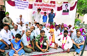 Members of the Valmiki community hold a protest at Samrala.
