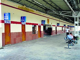 Passengers wait for trains at Samrala railway station. 