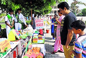 Visitors look at the models displayed during an exhibition at Green Land Convent School, New Subhash Nagar, Ludhiana. 