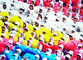 Malaysian schoolchildren perform during the 57th National Day celebrations at Independence Square in Kuala Lumpur on Sunday. Malaysia celebrated the independence of the Federation of Malaya from British rule in 1957