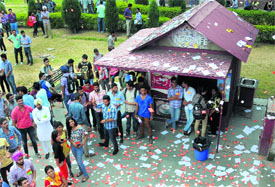 Party stickers and pamphlets lie strewn across the premises after the event at Panjab University on Monday. 