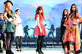 Students participate in a fashion show during the Open Intra-University Competition Magnitude on the LPU campus near Jalandhar.