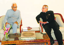 President Pranab Mukherjee being briefed by Governor NN Vohra about issues relating to the state on Monday