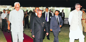 Governor NN Vohra hosted an At Home at Raj Bhawan for President Pranab Mukherjee on Monday