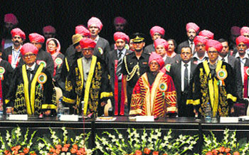 President Pranab Mukherjee (C) with Governor NN Vohra (L) and Chief Minister Omar Abdullah during the 14th convocation of the University of Jammu on Monday. 