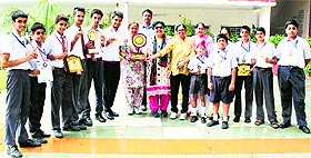 Winners of the Ludhiana Sahodaya School Badminton Tournament flaunt their trophies in Ludhiana.
