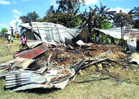 A damaged house after a gas pipeline exploded at Moran in Dibrugarh district of Assam on Monday