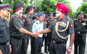 Lt Gen TS Gill, Chief of Staff, Western Command, bids farewell to senior officers as he demits offices on superannuation as Lt Gen Venugopal Menon (right), who takes over from him, looks on, in Chandimandir on Monday