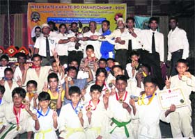 The winners with their medals in Dehradun on Monday