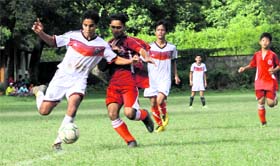 Players in action during the 16th Colonel Shashi Memorial Inter-School Soccer Tournament being played at Gorkha Military School in Dehradun on Monday