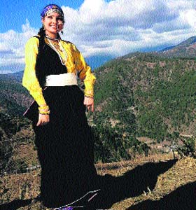 Traditional beauty: A village girl in her traditional attire in Garhwal during the Nanda Devi Raj Jaat Yatra