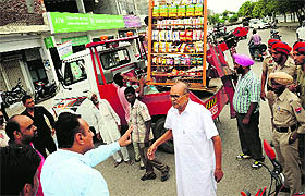 An official of the Improvement Trust argues with a shopkeeper during an anti-encroachment drive at Bharat Nagar market in Bathinda on Tuesday.