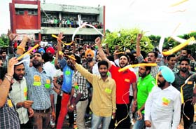 SOI supporters raise slogans during the election campaign at the UIET on Tuesday