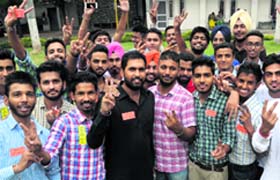 Supporters of SOPU and PUSU in a jubilant mood after entering into an alliance at the PGGC-11 on Tuesday