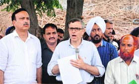 Omar Abdullah addresses a gathering at a village in RS Pura on Tuesday