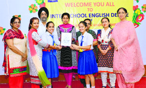 Winners of the inter-school debate competition at GGN Public School.