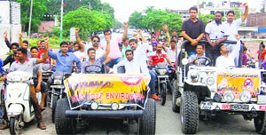 Members of the Yuva Shakti Parishad, an NGO, take out a car and bike rally against drugs. 