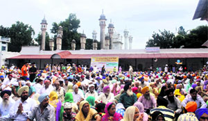 Devotees gather at Ram Rai Darbar in Dehradun on Tuesday to observe Mahanirvana Parv.