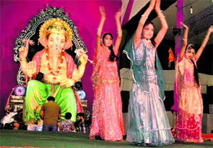 School students present a dance as part of Ganesh Utsava at the Ganpati Mandal at Rishikul in Haridwar on Tuesday.