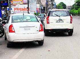 vehicles parked on the Madan Mohan Malviya road in Amritsar lead to traffic snarls.