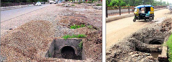 No barricades have been placed around an open pit; and (right) an auto-rickshaw passes by an open pit dug on the airport road in Amritsar.