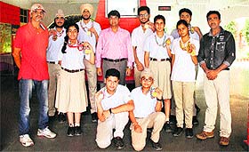 Students of Spring Dale Senior School, who won medals at shooting championship, in Amritsar.