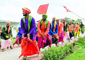 Armymen perform bhangra during the flagging of a trekking expedition in Bathinda on Wednesday.