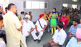 A meeting between the school management committee and parents in progress at Guru Nanak Dev Public Secondary School in Bathinda on Wednesday.