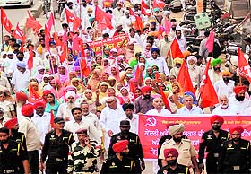 Activists of the Left parties hold a protest march in Bathinda on Wednesday. 