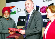 JS Bedi, chairman of the Gian Jyoti Group, and Prof Leigh Drake, Executive Dean of the Faculty of Business, Economics and Law, at the La Trobe University, Australia, sign an MoU in Mohali on Wednesday