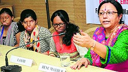 Renu Mathur (right) addresses a gathering during the launch of a programme, ‘Support Helpline’, in Chandigarh on Wednesday