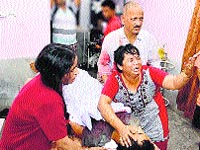 Family members with the body of Aditya Parashar at the District Hospital in Una on Tuesday night. Photo: Rajesh Sharma