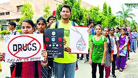 Students of SCD Government College participate in an anti-drug rally in Ludhiana on Wednesday. 