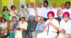 Officers who had served in 51 Mountain Regiment along with their wives at a get-together in Chandigarh