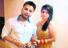 Gill with his wife Krispy Khaira