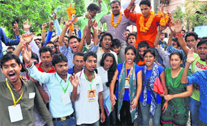 Students canvass for the upcoming elections; (and) the K2 group declares candidates at DAV PG College in Dehradun on Wednesday. 