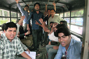 Agitating employees of Uttarakhand Purva Sainik Nigam Limited protest after being arrested at Parade Ground in Dehradun on Wednesday. 