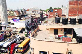 An aerial view of hotels and guest houses, mushrooming around the Golden Temple in Amritsar