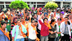 ABVP activists raise slogans during an election rally at the UIET in Sector 25, Chandigarh, on Thursday. Tribune photo: Parvesh Chauhan