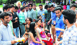 Student leaders meet voters on the last day of campaigning at GGDSD College in Sector 32, Chandigarh, on Thursday. Tribune photo: Manoj Mahajan