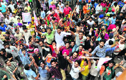 Supporters of PUSU cheer their party leaders during a rally at the Student Centre, Panjab University, in Chandigarh on Thursday. Tribune photos: Parvesh Chauhan
