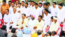 INLD leader Abhay Chautala addresses people at Rania in Sirsa district on Thursday.