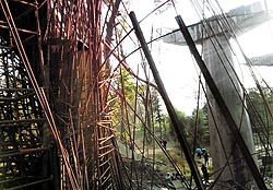 A view of the collapsed bridge on the Pathankot-Mandi national highway