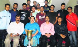 Members of the victorious fencing team of Government MAM College pose for a photograph along with the principal and faculty of the institute in Jammu on Thursday. A Tribune photo