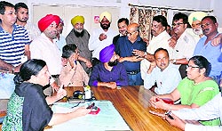 Congress councillors lodge protest with the District Food and Civil Supplies Controller against bias in the distribution of blue cards in Jalandhar on Thursday