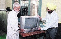 Due to heavy rain for the past few days, indoor arrangements being made in a school for the PMs speech to be telecast on Teachers Day in Jalandhar