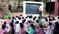 Government school teachers struggle hard to teach the poor children under pathetic infrastructure provided by the state goverment in Jalandhar