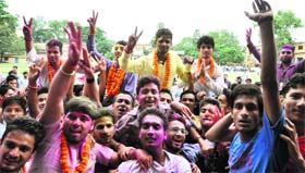 Supporters of the winning candidates celebrate at DBS College in Dehradun after the results of the student union elections were announced on Thursday.