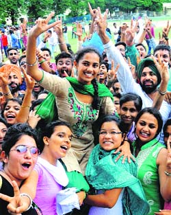 Ramadeep Kaur (KCSU and INSO alliance), who was elected president at the GGSC in Sector 26, celebrates with supporters.