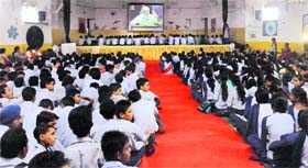 Children watch Prime Minister Narendra Modis live address on Teacher's Day at Government Model Senior Secondary School, Sector 10, Chandigarh, on Friday.